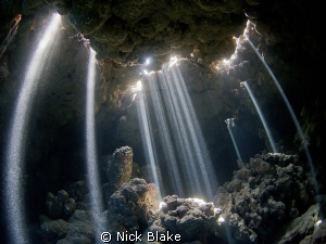 A spectacular natural light show in the caves of Jackfish... by Nick Blake 